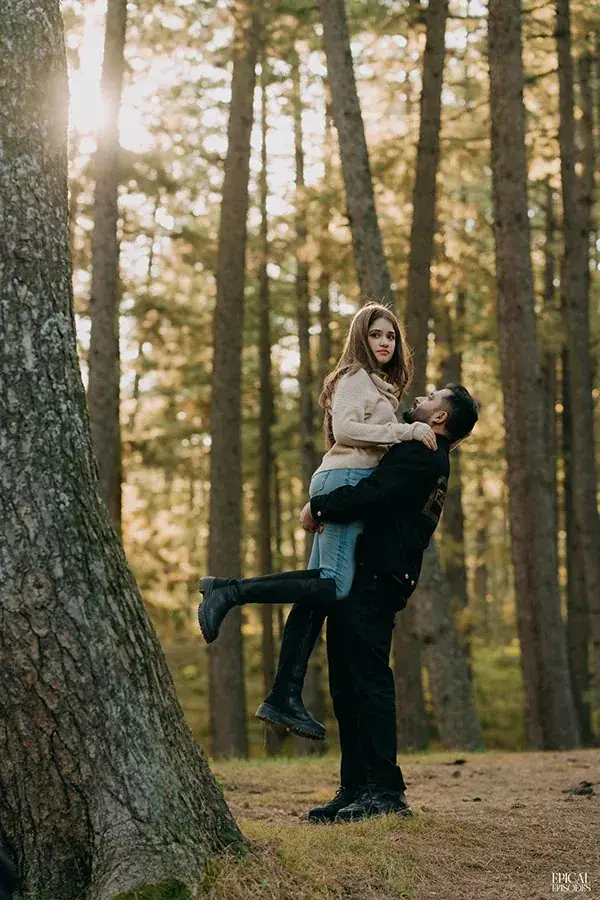 Sagar lifting Pritika among the pines